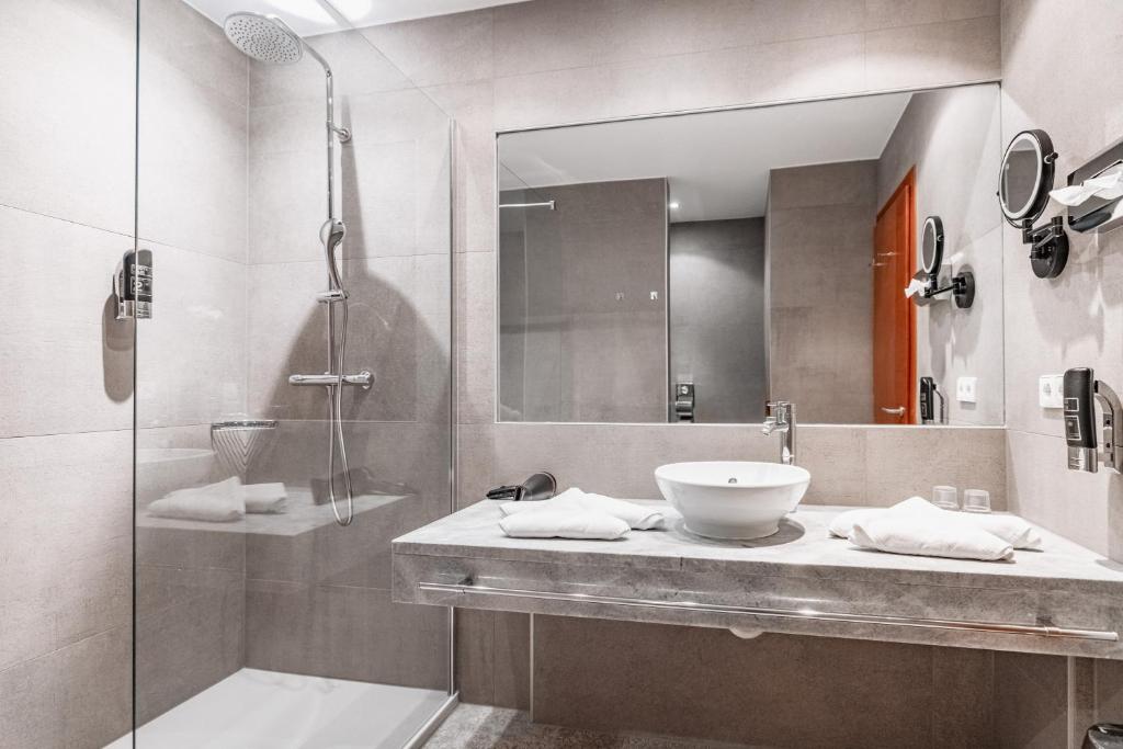 Koupelna v ubytování Alpen Adria Hotel & Spa