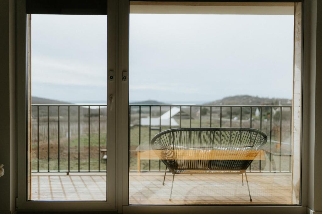 A balcony or terrace at Vass Villa Vendégház és Pincészet Felsőörs