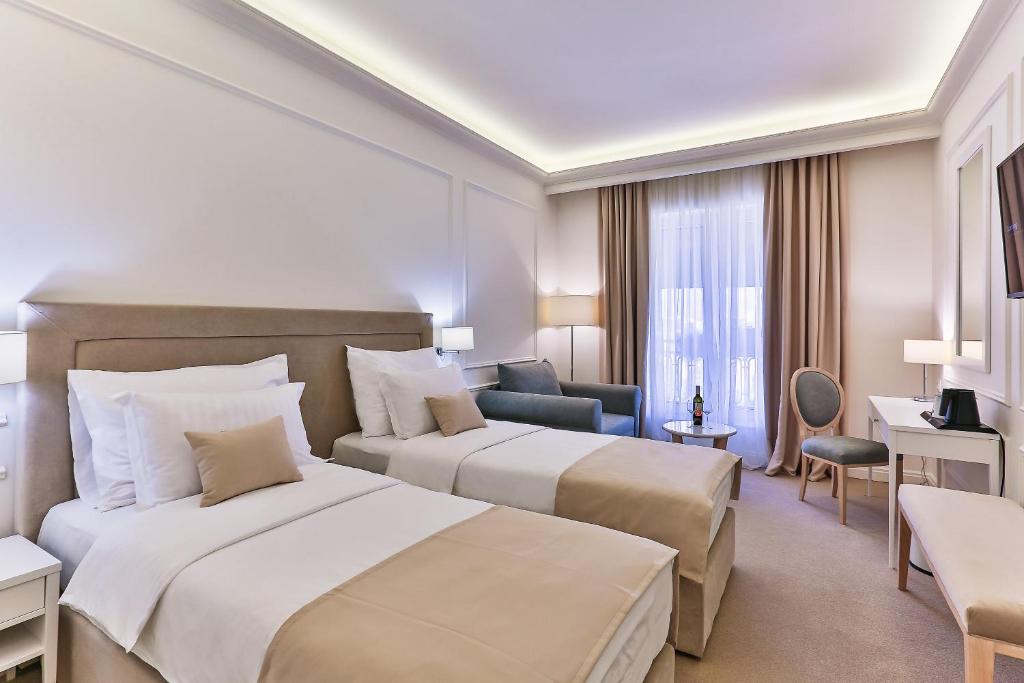 Postel nebo postele na pokoji v ubytování Hotel EDEN