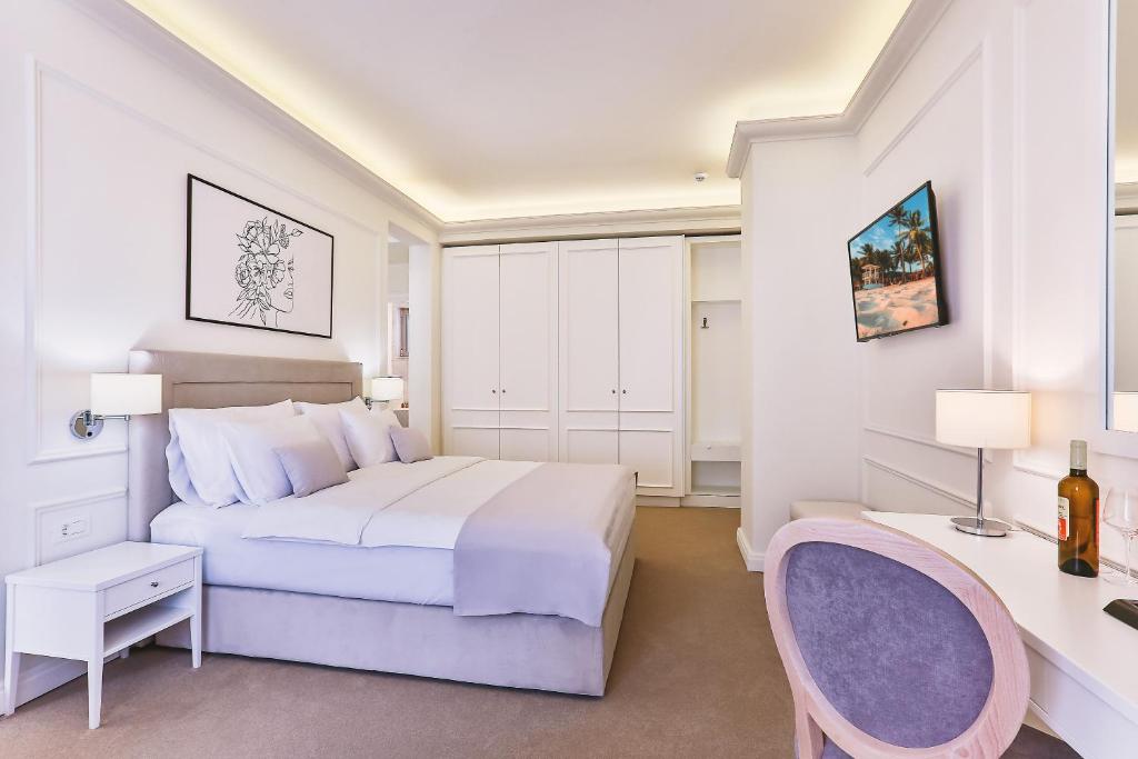 Postel nebo postele na pokoji v ubytování Hotel EDEN