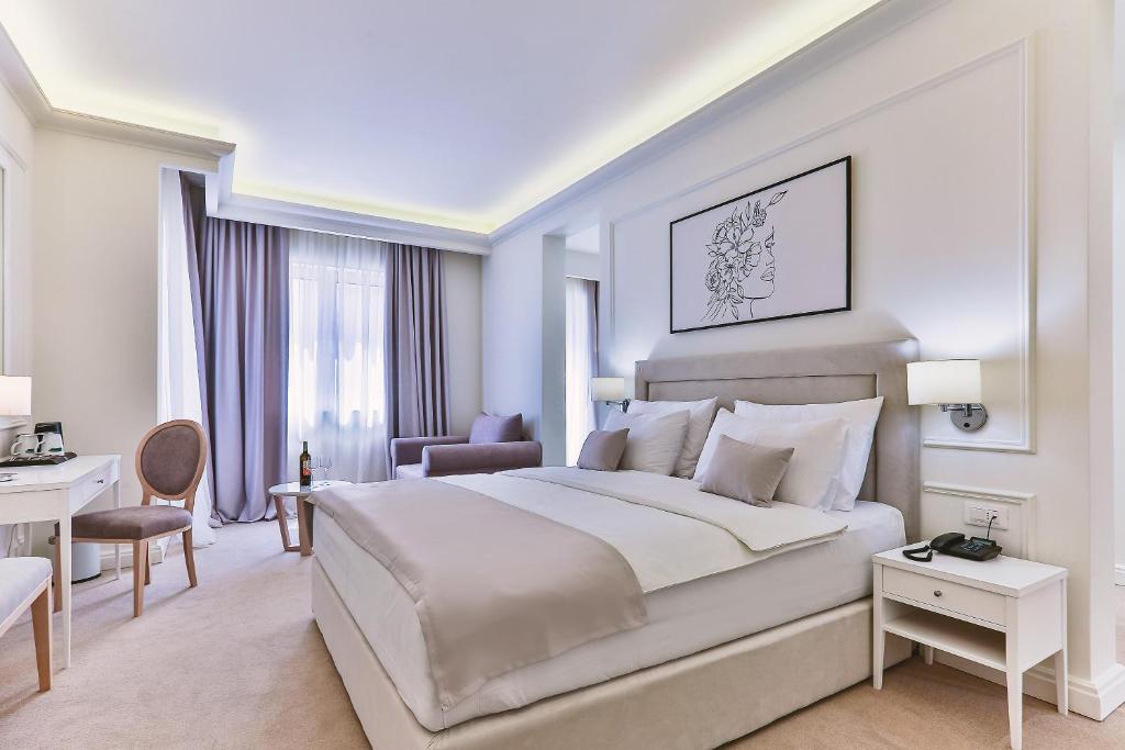 Postel nebo postele na pokoji v ubytování Hotel EDEN