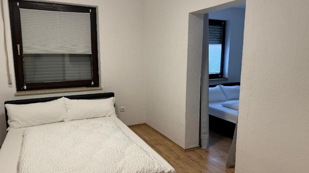 Postel nebo postele na pokoji v ubytování Ferienhaus Alexandra in Thyrnau