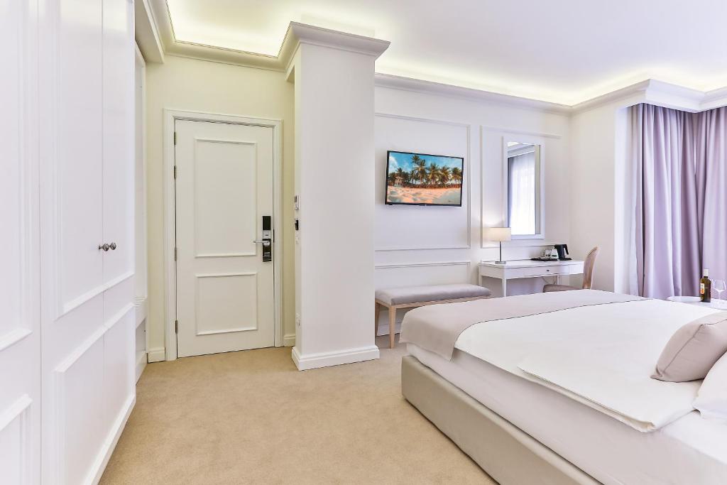 Postel nebo postele na pokoji v ubytování Hotel EDEN