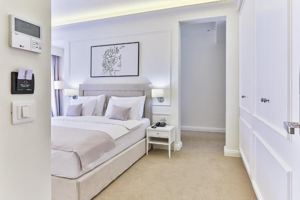 Postel nebo postele na pokoji v ubytování Hotel EDEN