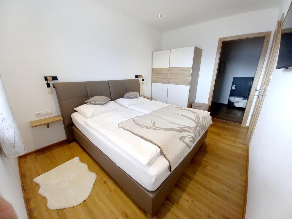 Posteľ alebo postele v izbe v ubytovaní Panorama Appartements Filzerhof
