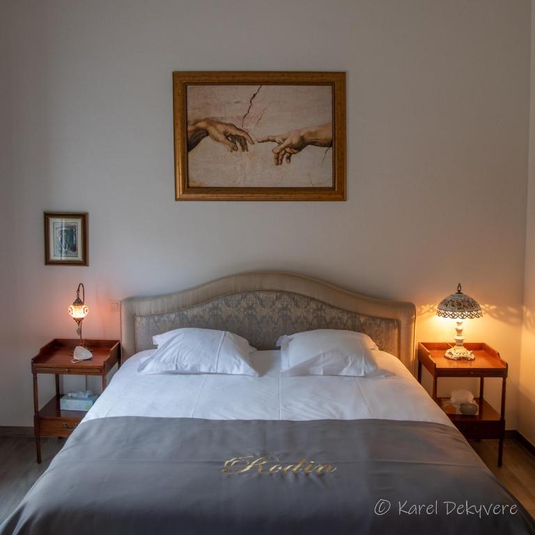 Postel nebo postele na pokoji v ubytování B&B Domein Rodin