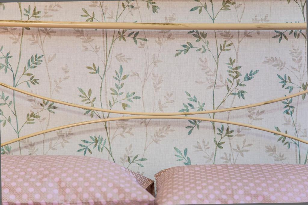 Postel nebo postele na pokoji v ubytování La Borgata Rooms