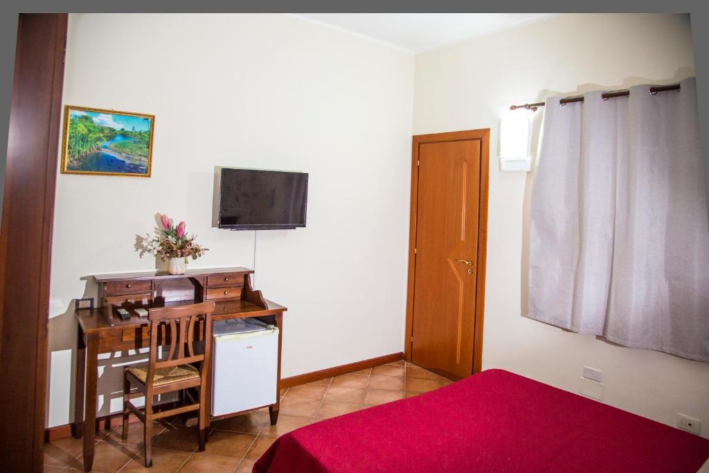 TV a/nebo společenská místnost v ubytování La Borgata Rooms
