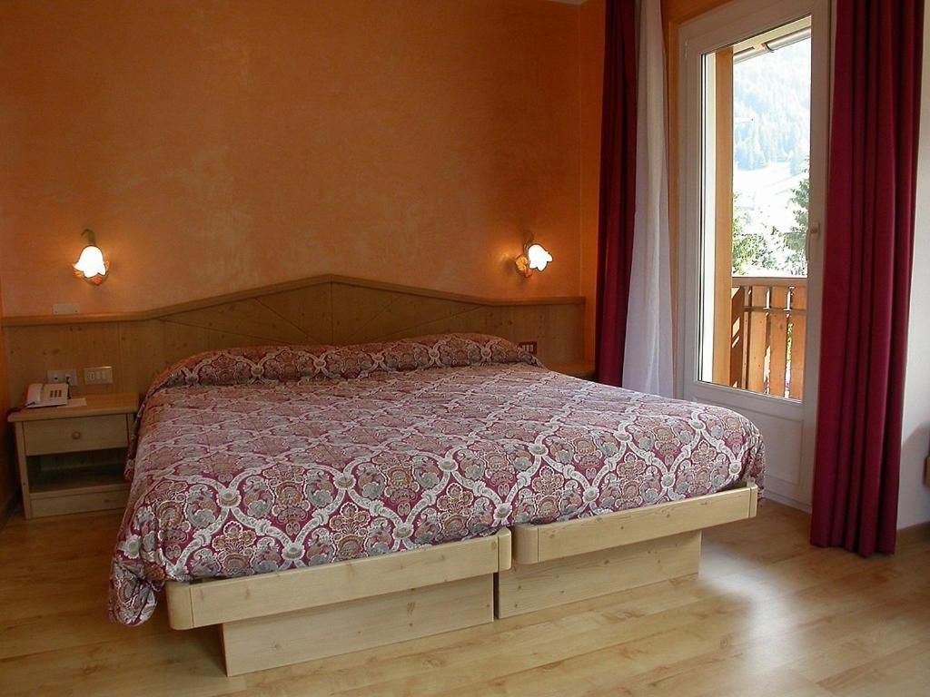 Postel nebo postele na pokoji v ubytování Hotel Bellaria