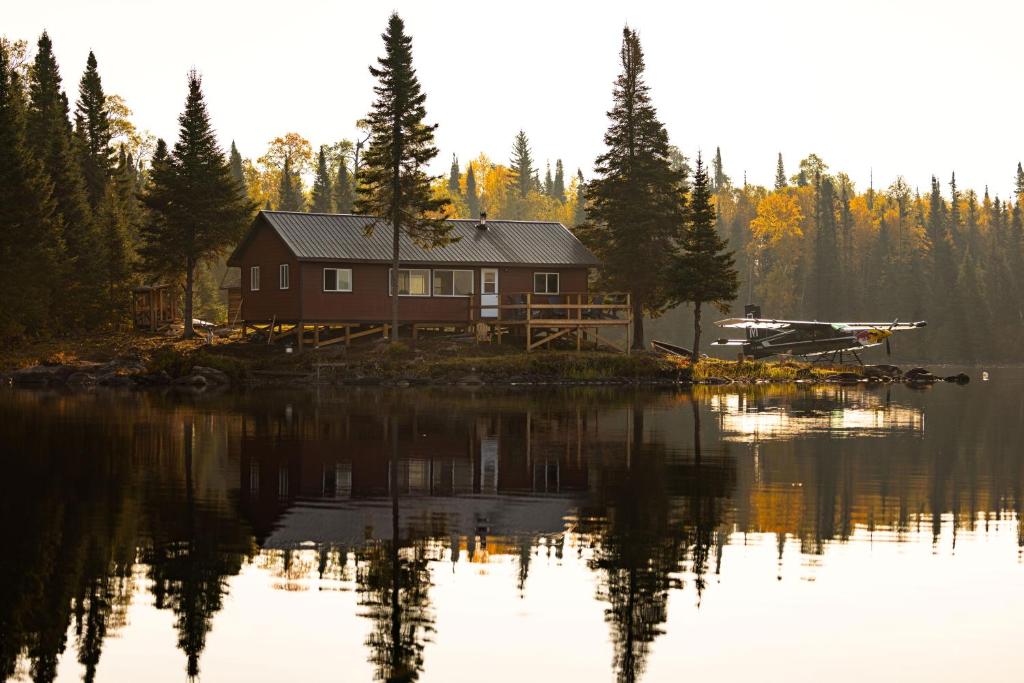 a house on the shore of a body of water at South McInnes in Red Lake