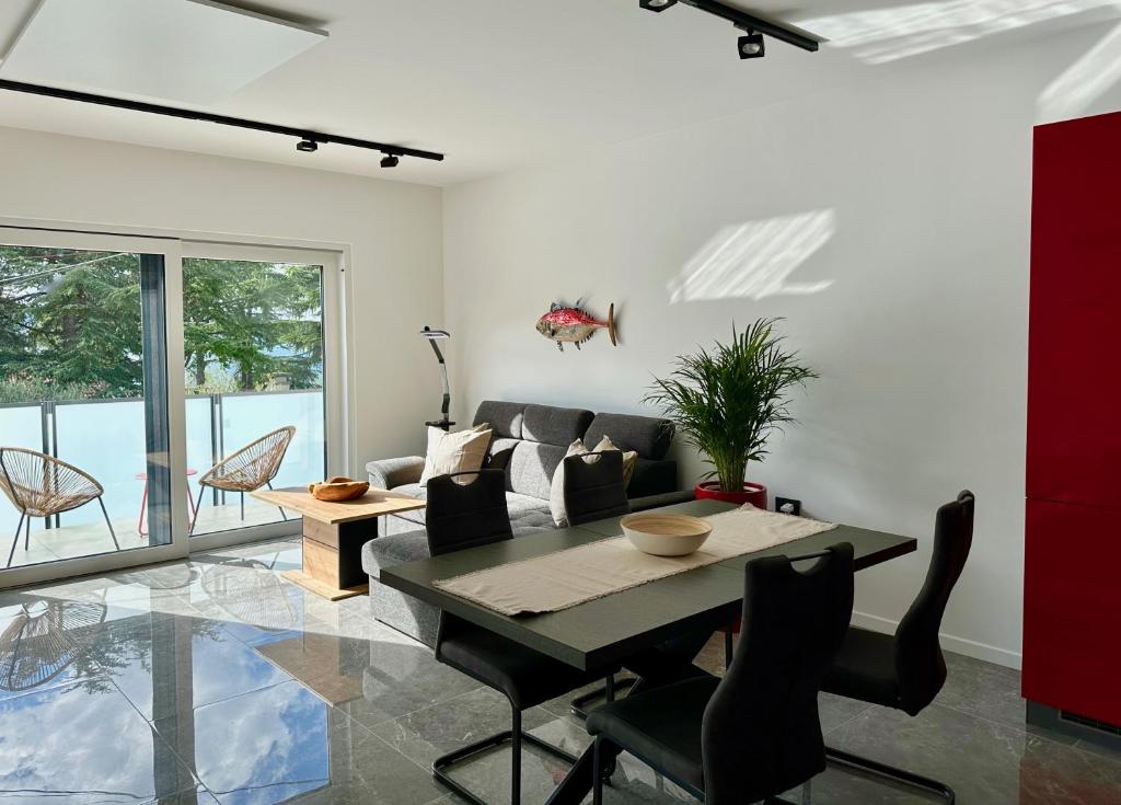 Posezení v ubytování Apartments E&T by Locap Group