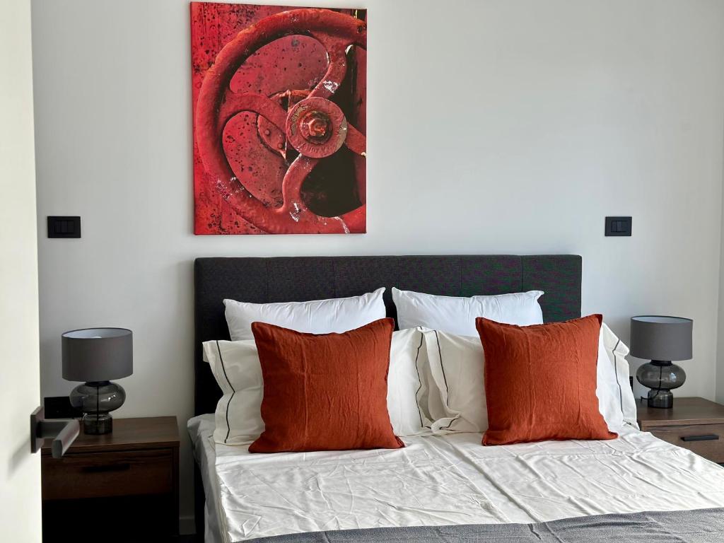 Postel nebo postele na pokoji v ubytování Apartments E&T by Locap Group