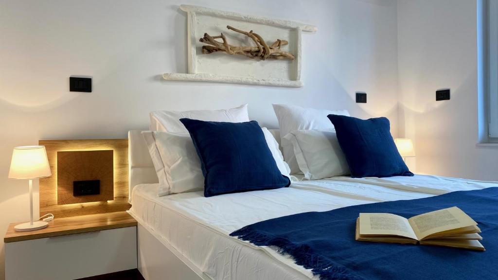 Postel nebo postele na pokoji v ubytování Apartments E&T by Locap Group