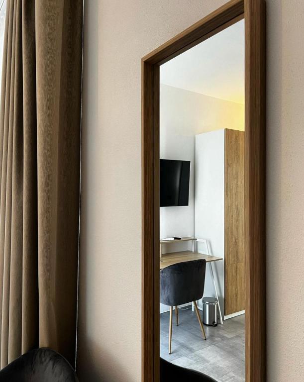Телевизор и/или развлекательный центр в Pinea b&b