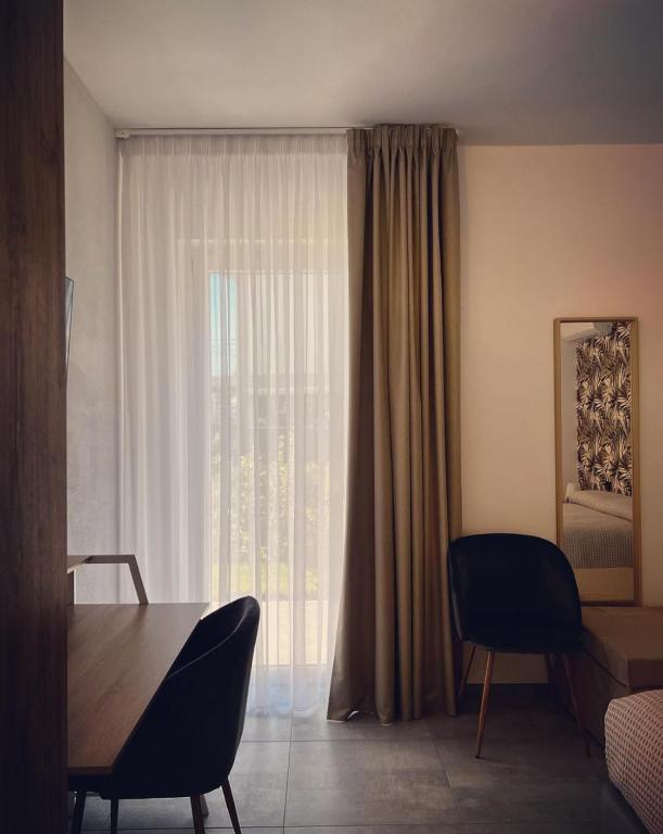 Гостиная зона в Pinea b&b