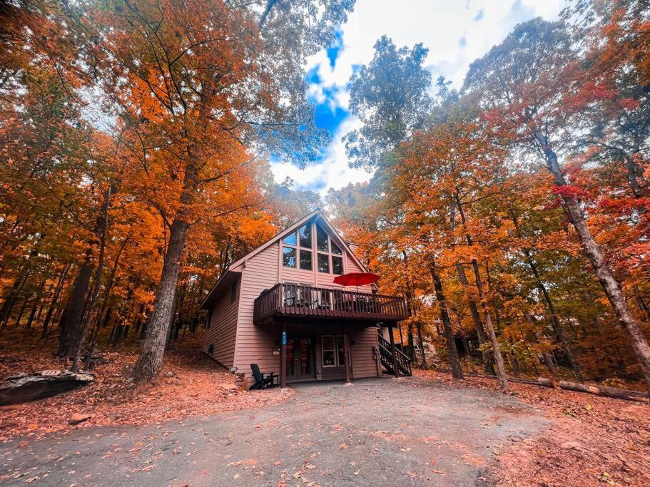 a small house in the middle of the forest at A-Frame @ WTG Resort w/ Hot Tub in Mount Torry Furnace