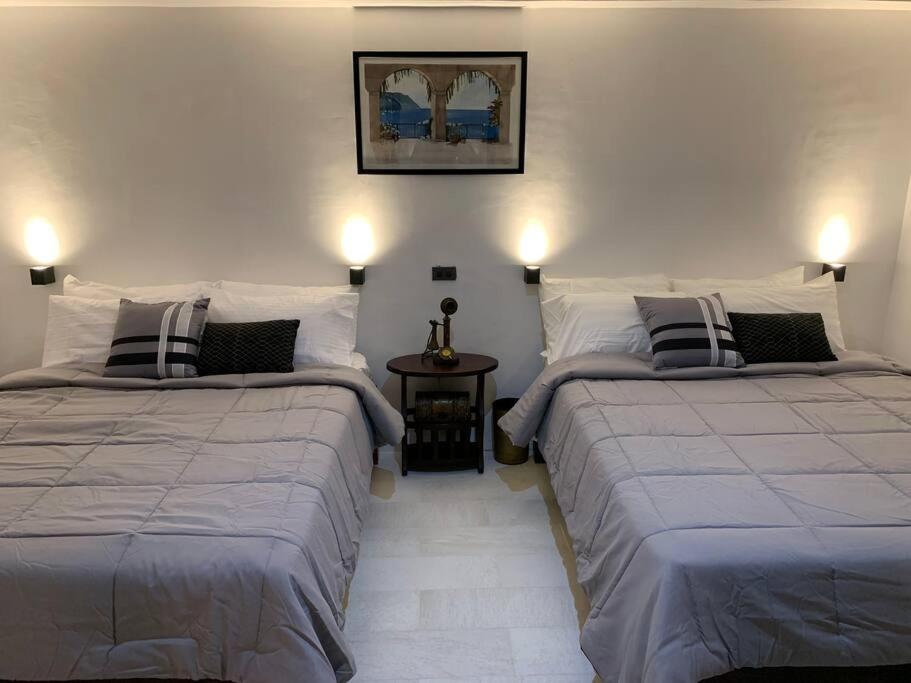 Postel nebo postele na pokoji v ubytování Paradores Filipinas