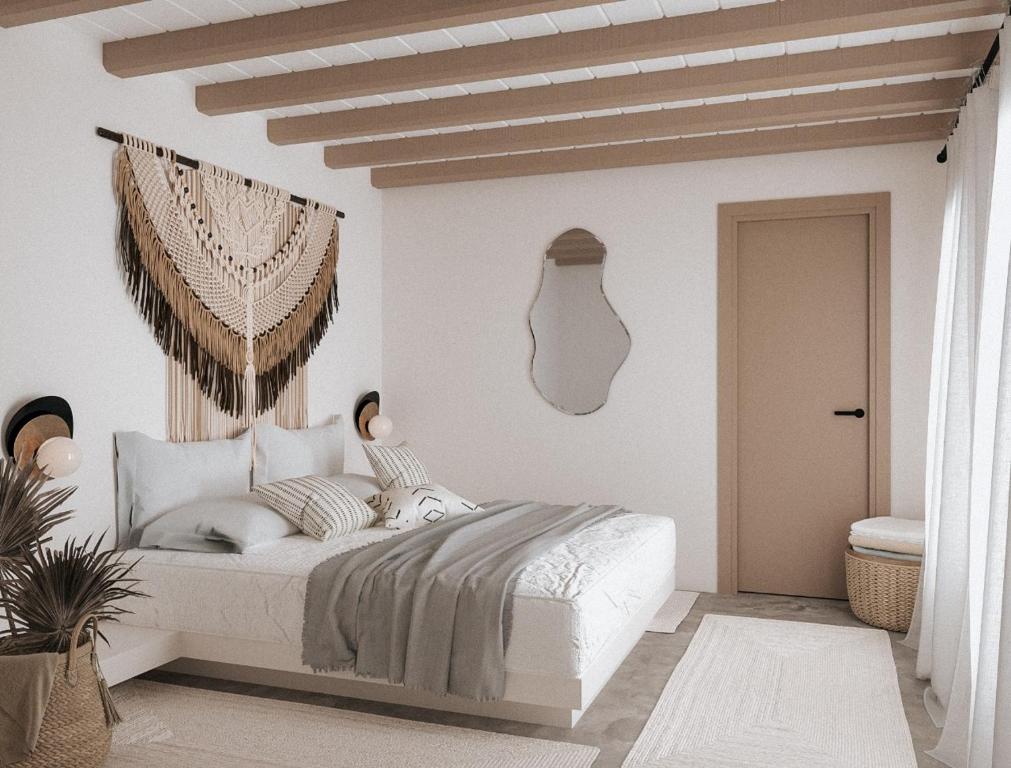 Posteľ alebo postele v izbe v ubytovaní Aelia Hospitality Paros
