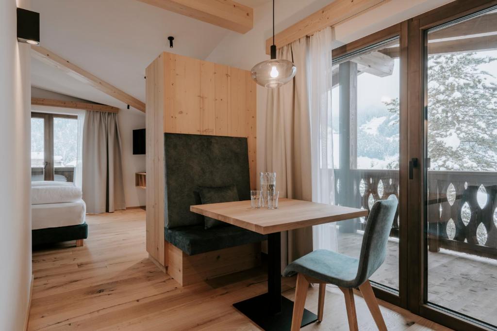 Postel nebo postele na pokoji v ubytování Garni Residence Alnö - Adults Only