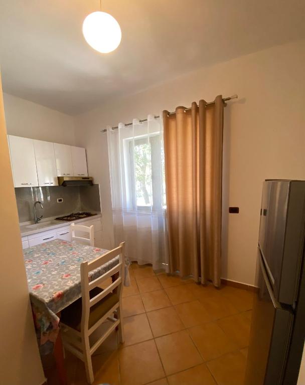 Kuchyň nebo kuchyňský kout v ubytování Apartment Sun Roll
