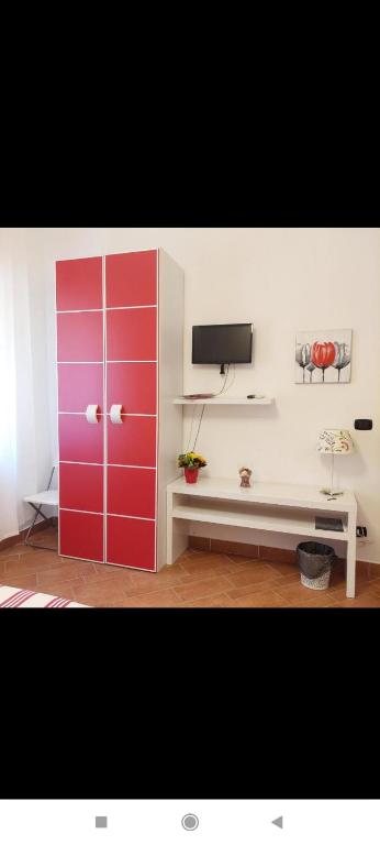 TV a/nebo společenská místnost v ubytování B&B Camere e Cassata