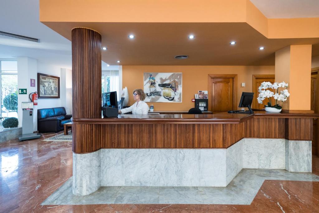 The lobby or reception area at Sagitario Playa