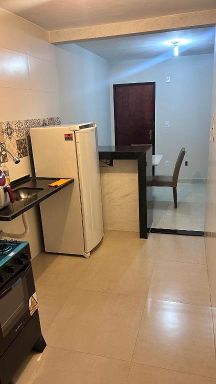 Kuchyň nebo kuchyňský kout v ubytování Adonai Campos dos Goytacazes parque rodoviário