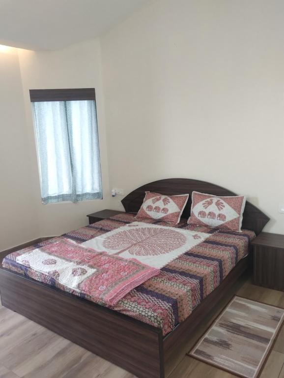 Giường trong phòng chung tại Thar Olive Cottages Pilani