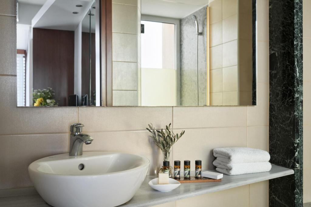Koupelna v ubytování Lato Boutique Hotel