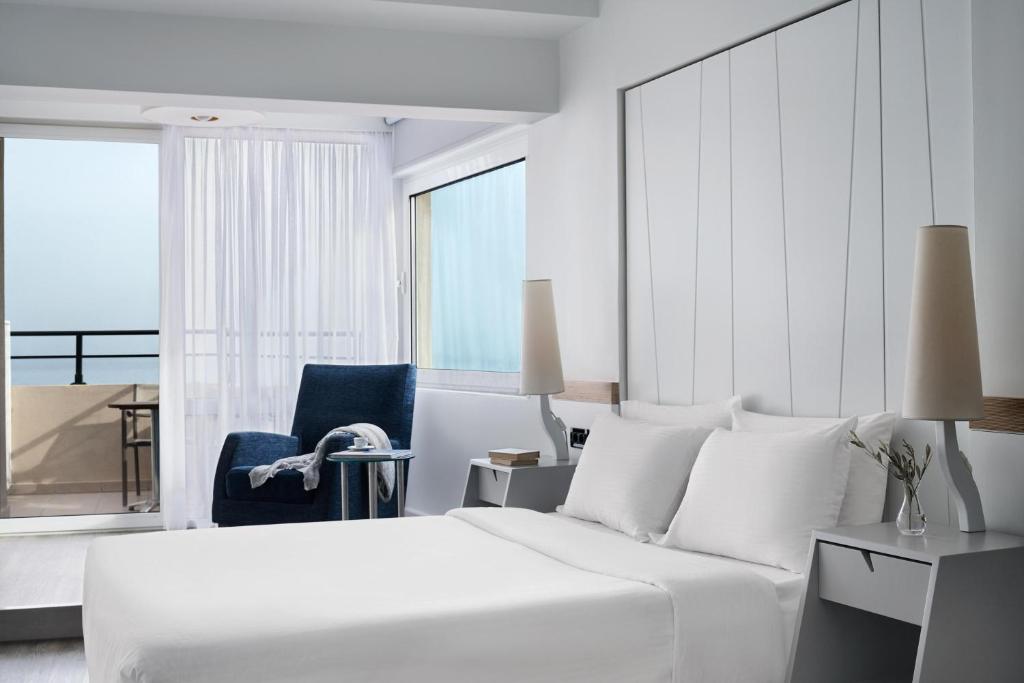 Postel nebo postele na pokoji v ubytování Lato Boutique Hotel