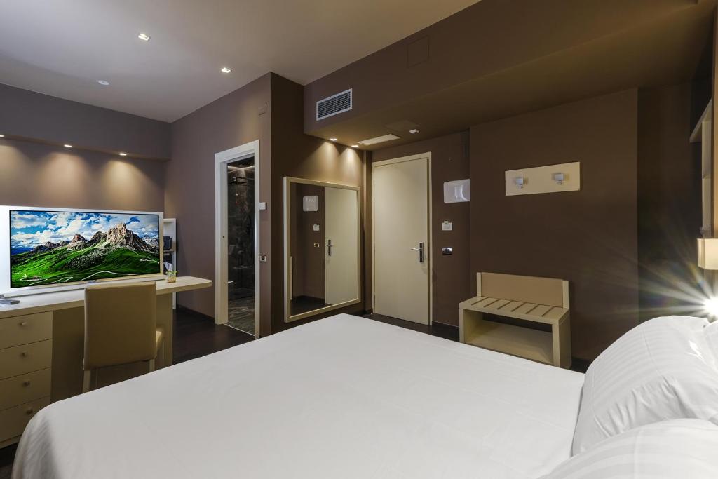 TV a/nebo společenská místnost v ubytování Hotel Touring