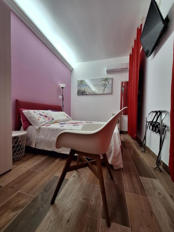 Postel nebo postele na pokoji v ubytování B&B Salvo e Terry
