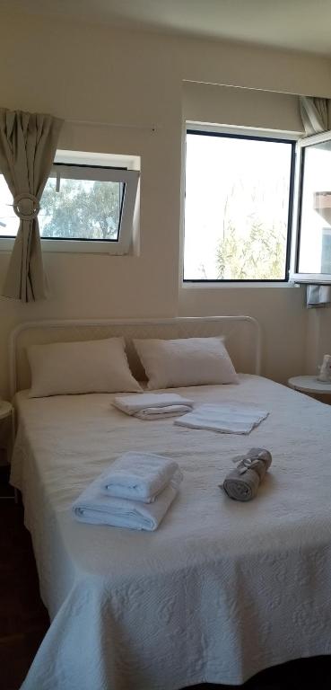 A bed or beds in a room at Maison de la mer