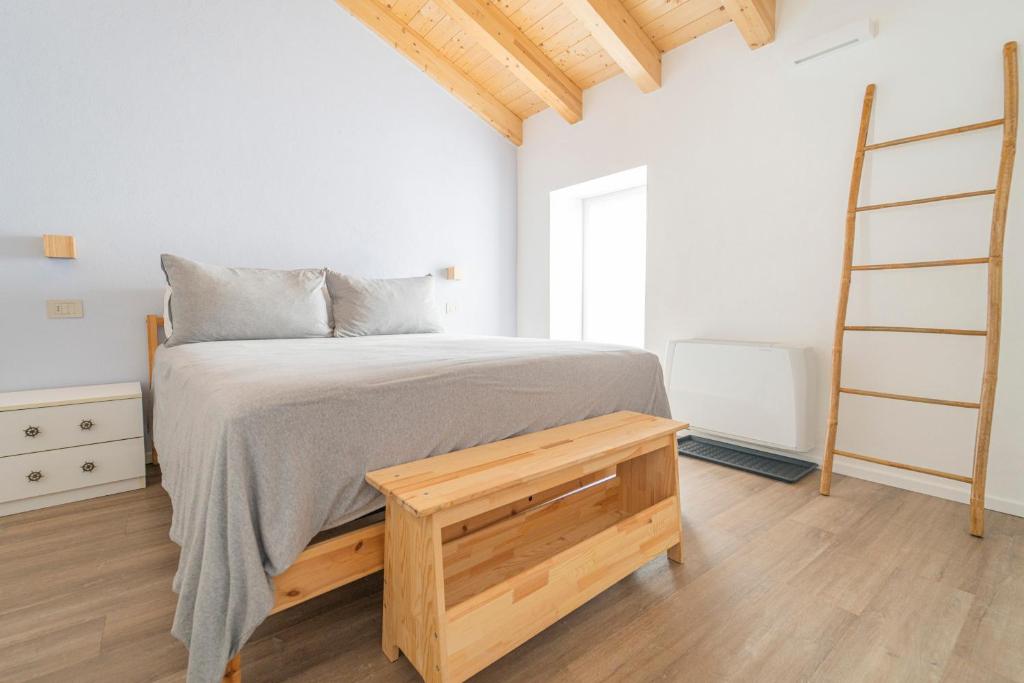 Postel nebo postele na pokoji v ubytování B&B La Volpe