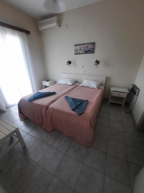 Postel nebo postele na pokoji v ubytování Jasmine