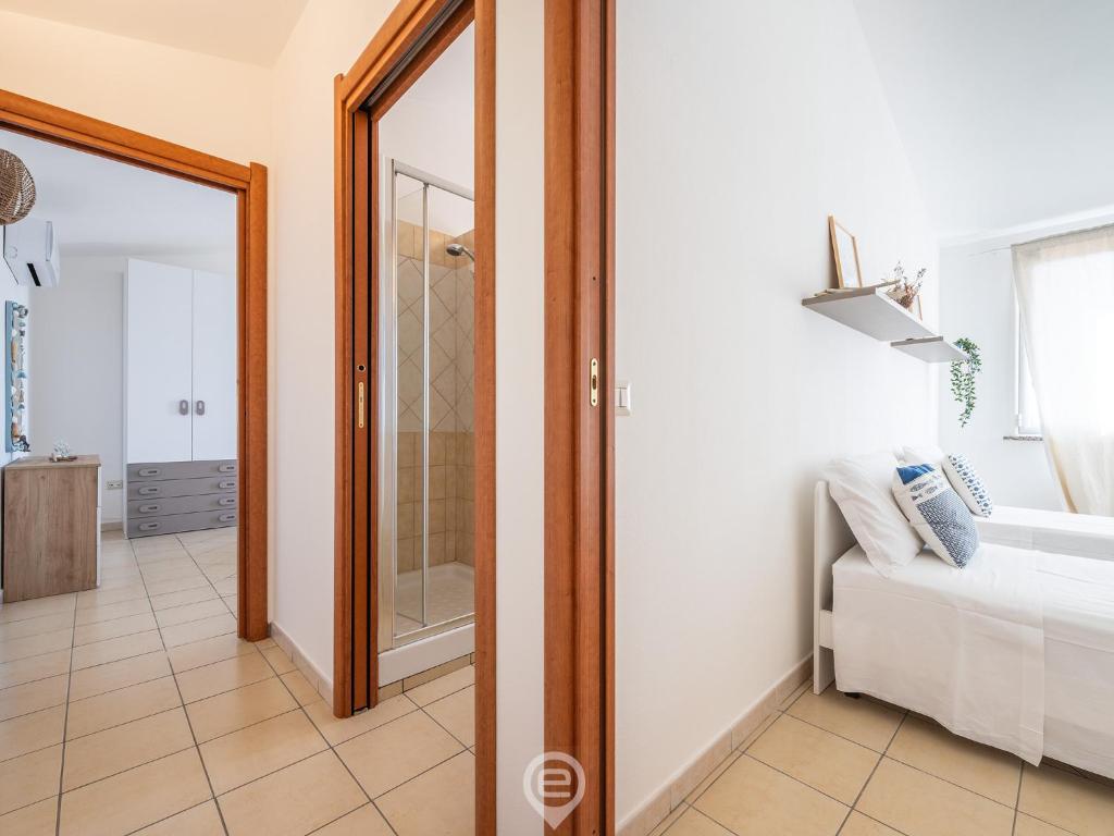 Postel nebo postele na pokoji v ubytování Pan Home