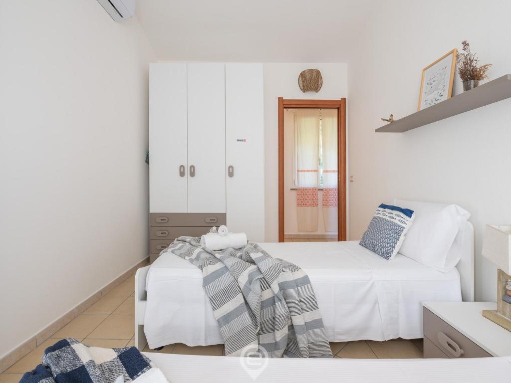 Postel nebo postele na pokoji v ubytování Pan Home