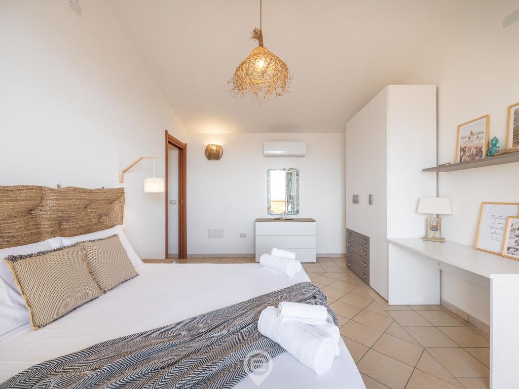 Postel nebo postele na pokoji v ubytování Pan Home