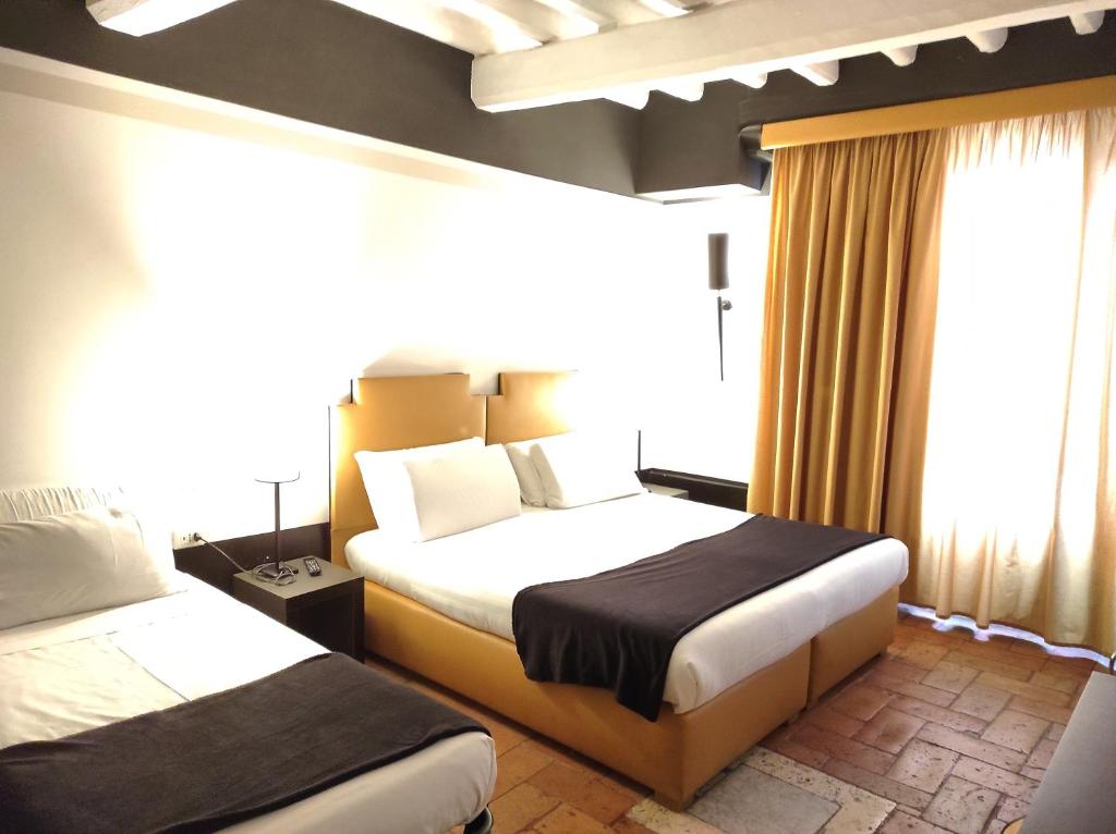 Relais Santa Maria Maggiore - Comfort Triple Room