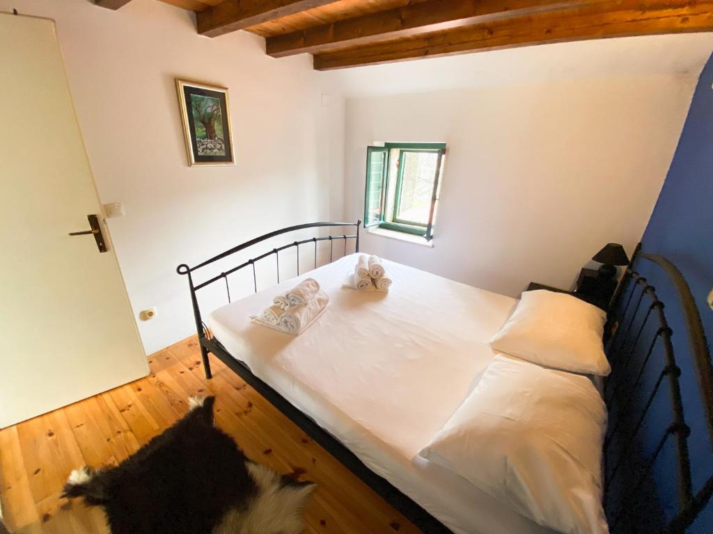 Posteľ alebo postele v izbe v ubytovaní Apartman Robi
