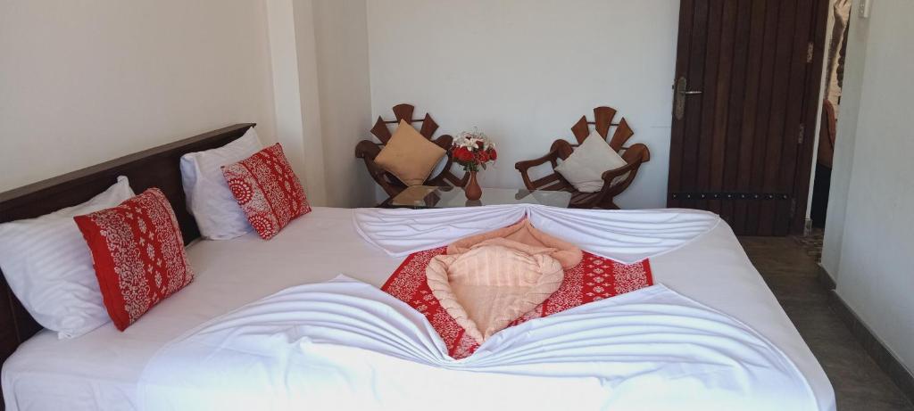 Postel nebo postele na pokoji v ubytování Kandy IVY Mountain View Resort