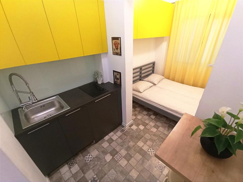 Postel nebo postele na pokoji v ubytování Art Studio Apartment