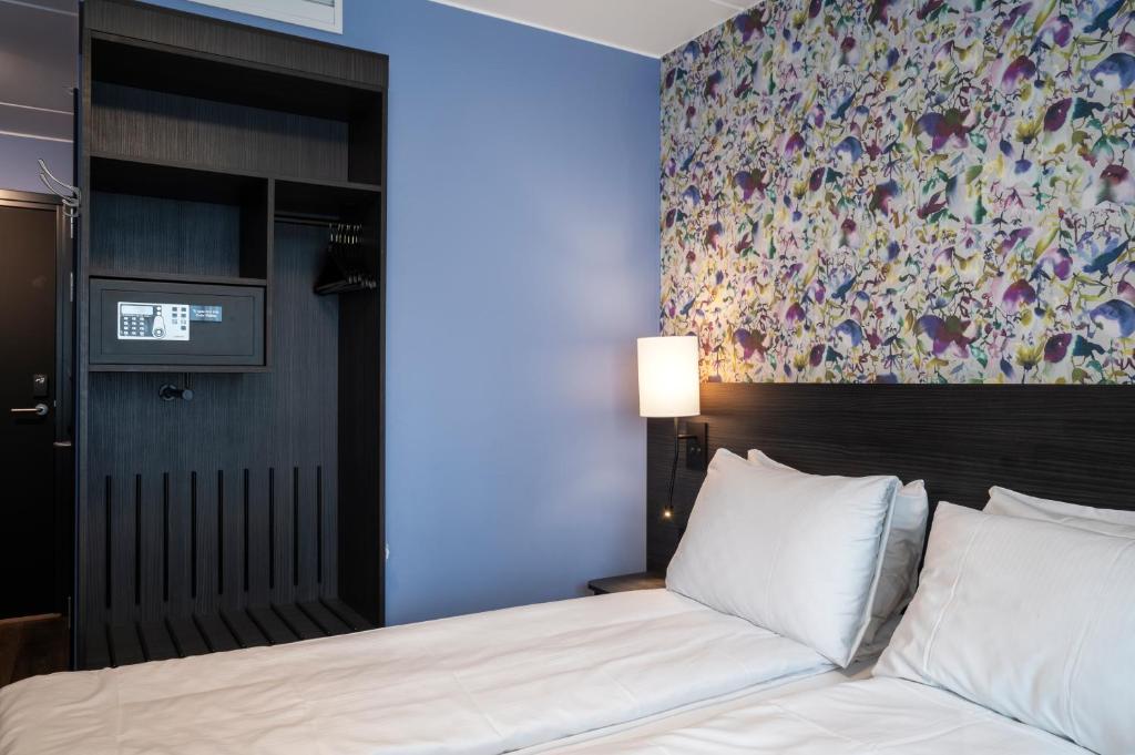 Postel nebo postele na pokoji v ubytování Thon Hotel Tromsø