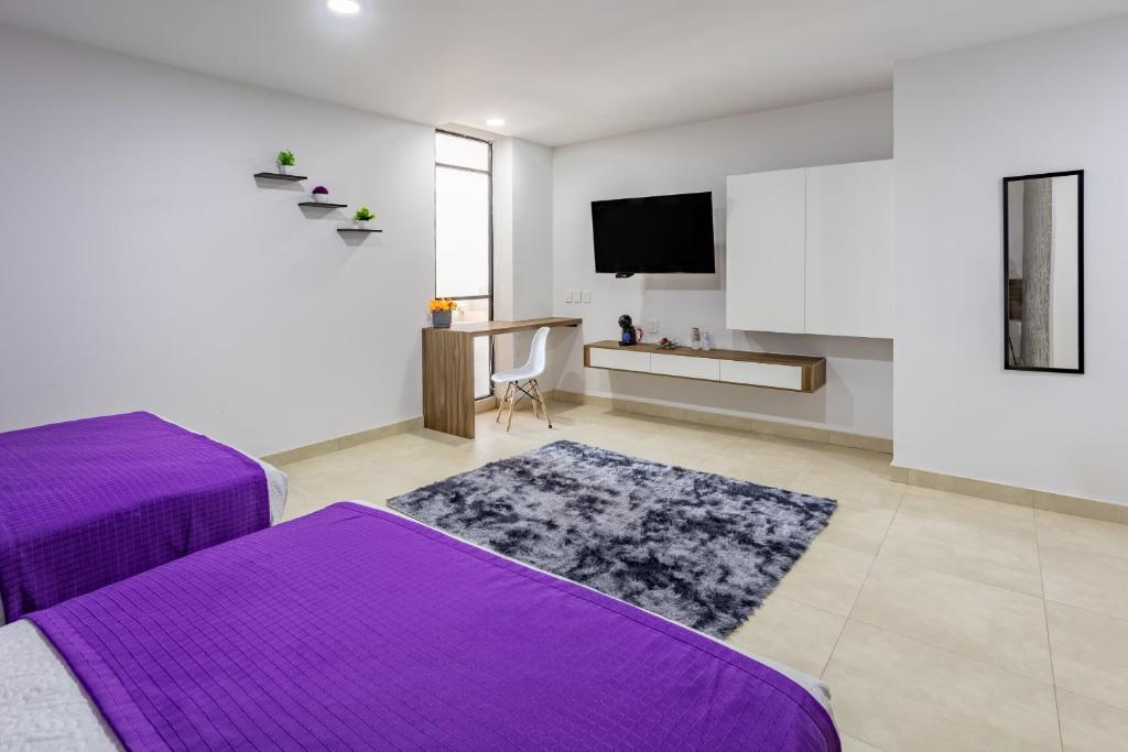 TV a/nebo společenská místnost v ubytování WinDay Hotel Express