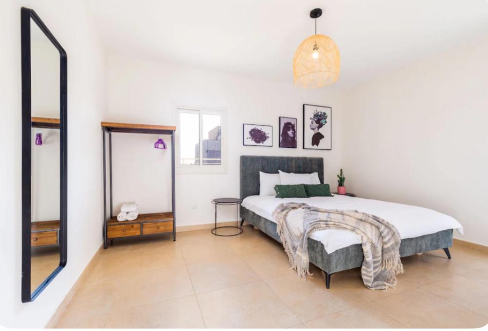 Postel nebo postele na pokoji v ubytování Apartment in Rehavia Jerusalem