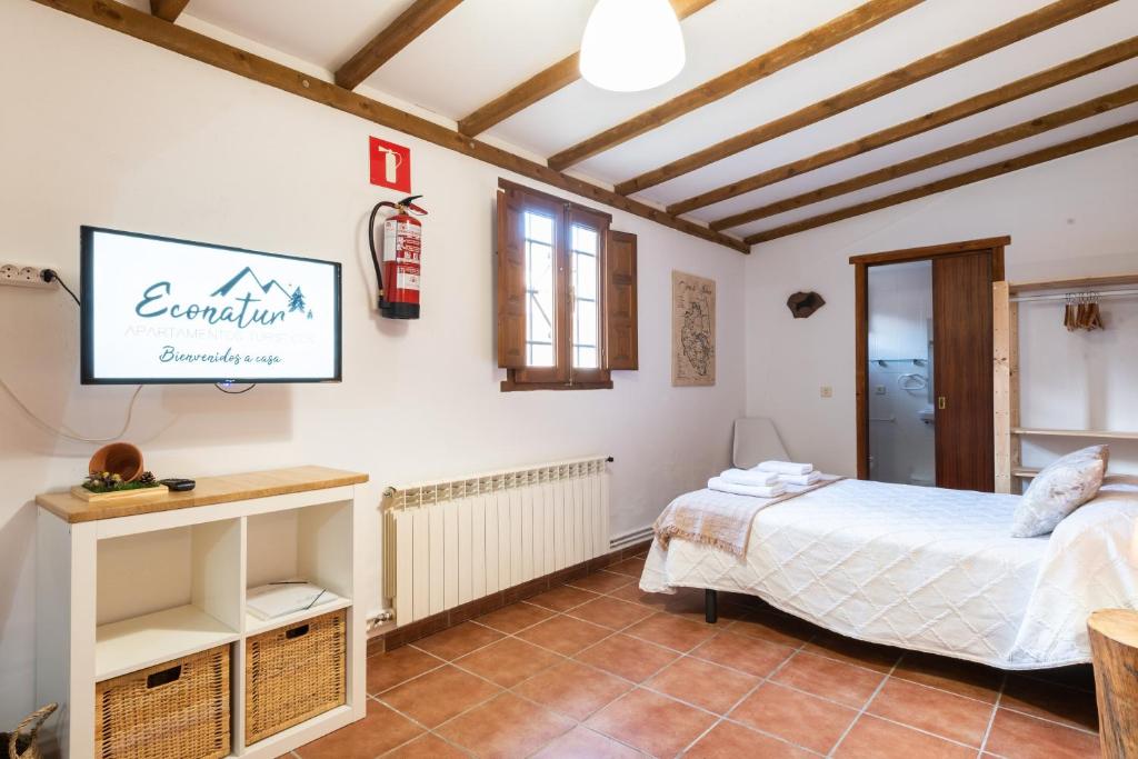 Postel nebo postele na pokoji v ubytování Apartamentos Econatur