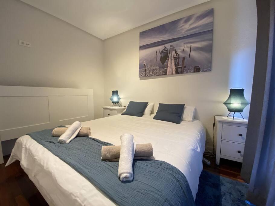 Ένα ή περισσότερα κρεβάτια σε δωμάτιο στο Telletxe Residence