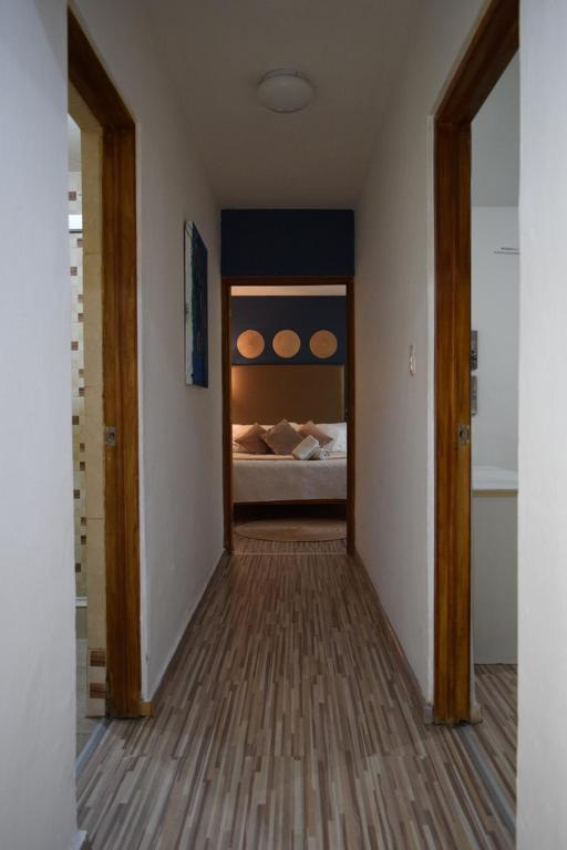 Postel nebo postele na pokoji v ubytování Casa Miranda Morelos