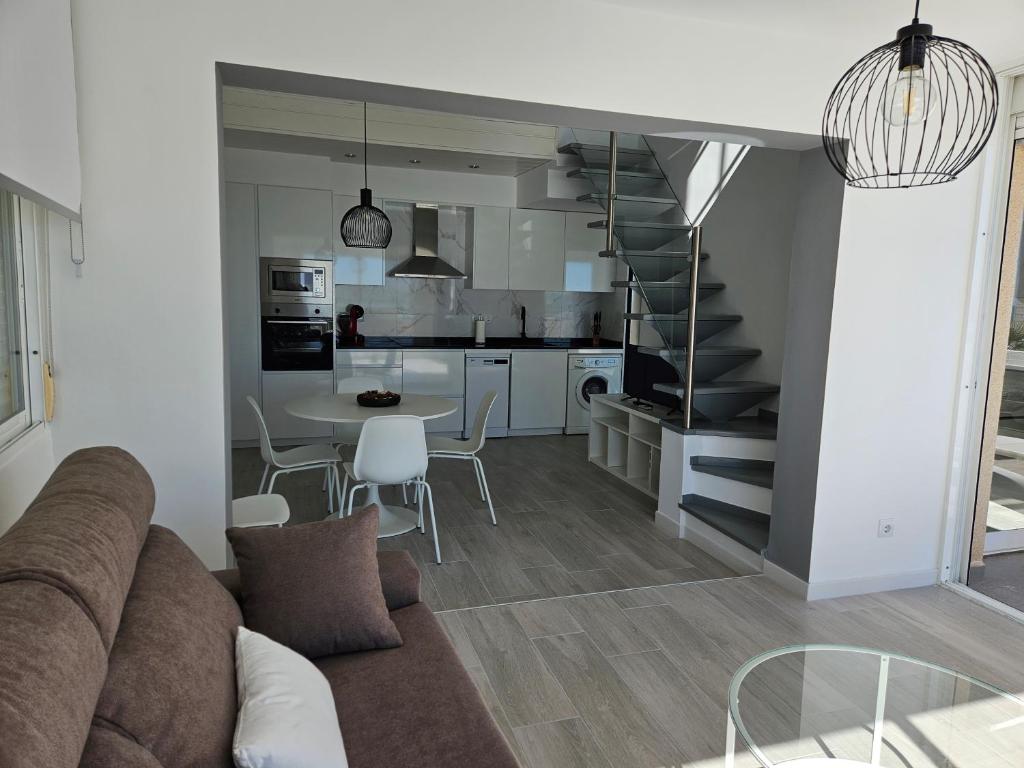 A kitchen or kitchenette at FANTÁSTICO DÚPLEX CON VISTAS IMPRESIONANTES AL MAR