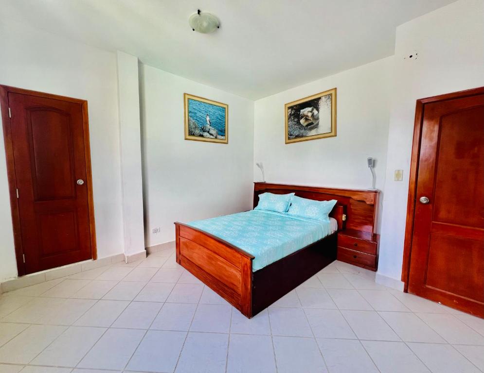 Postel nebo postele na pokoji v ubytování Hotel Sierra Negra